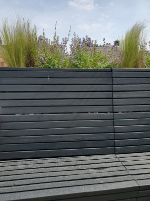 Tall dining bench with built in planter Tall dining bench with built in planter