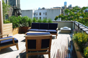 After - Custom wood deck, planters and pergola for adding privacy and enhancing the view After West Village Roof garden