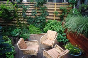 Cozy rear deck with custom fence & planters Cozy rear deck with custom fence & planters