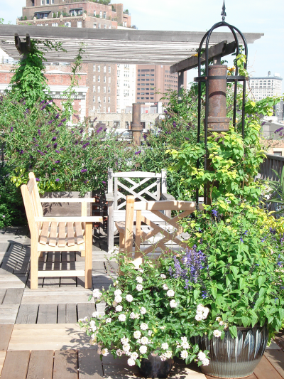 Decked seating area with Pergola & Planters Decked seating area with Pergola & Planters
