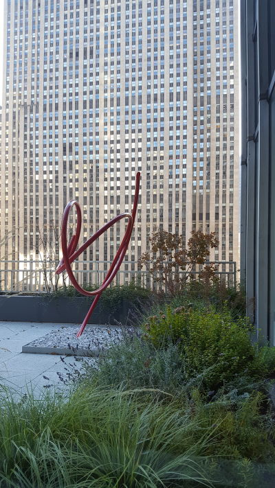 Perimeter Shrub and perennial border with sculpture Perimeter Shrub